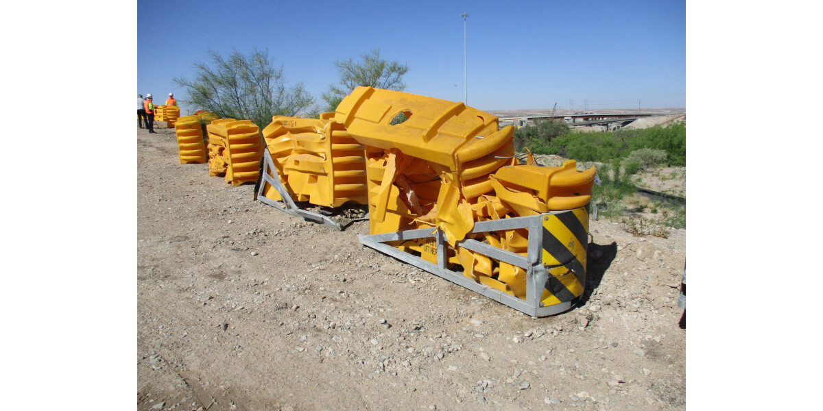 Wrecked crash attenuators wall